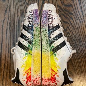 Adidas rainbow splattered Superstar sneakers